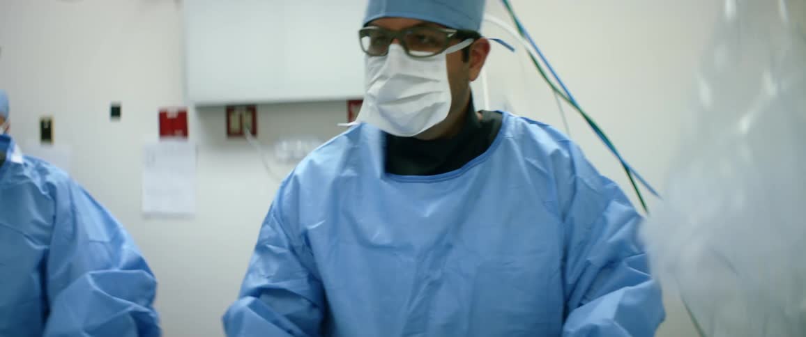 Two surgeons working in an operating room