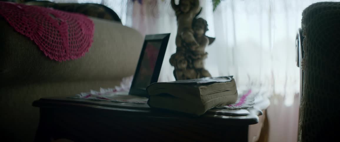 A book sits on a table in a home