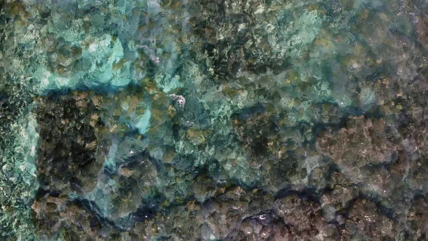 Birds eye view of ripples and waves in the ocean