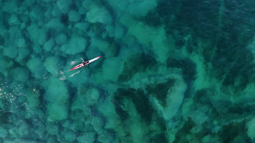 Kayak on bright blue ocean