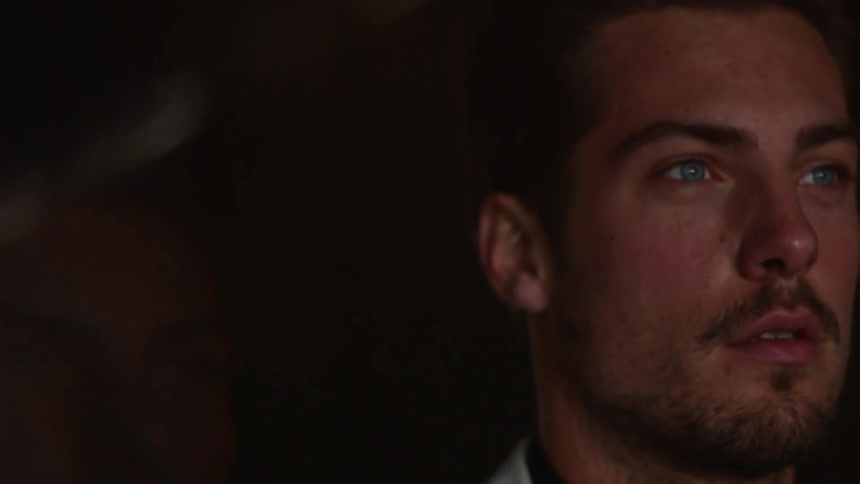 A man slowly blinks his eyes