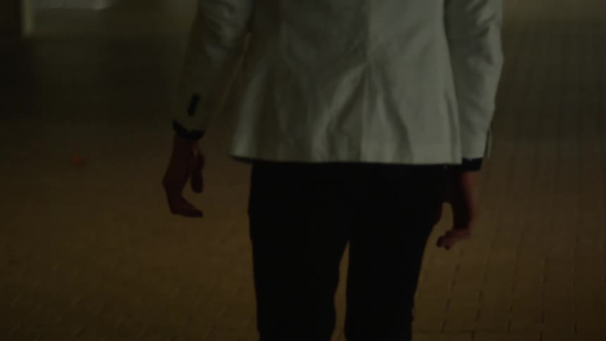 A person is walking in a building