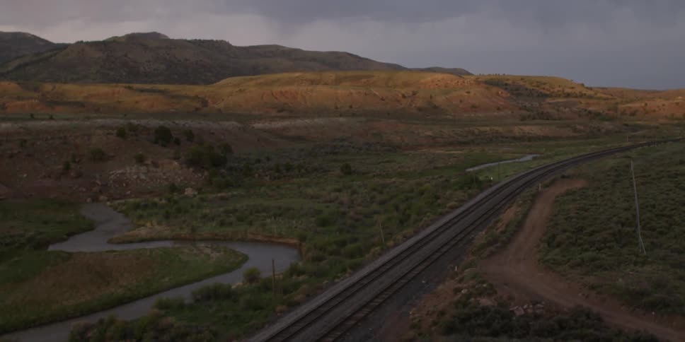 A train through a brush field