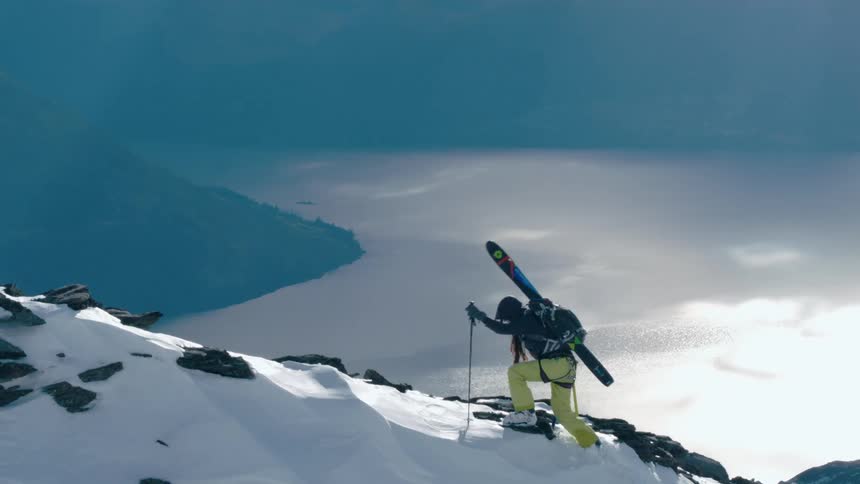 A person is hiking up the mountain