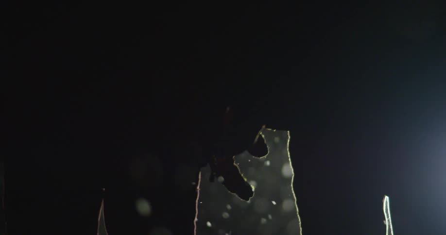 Two people are walking at night