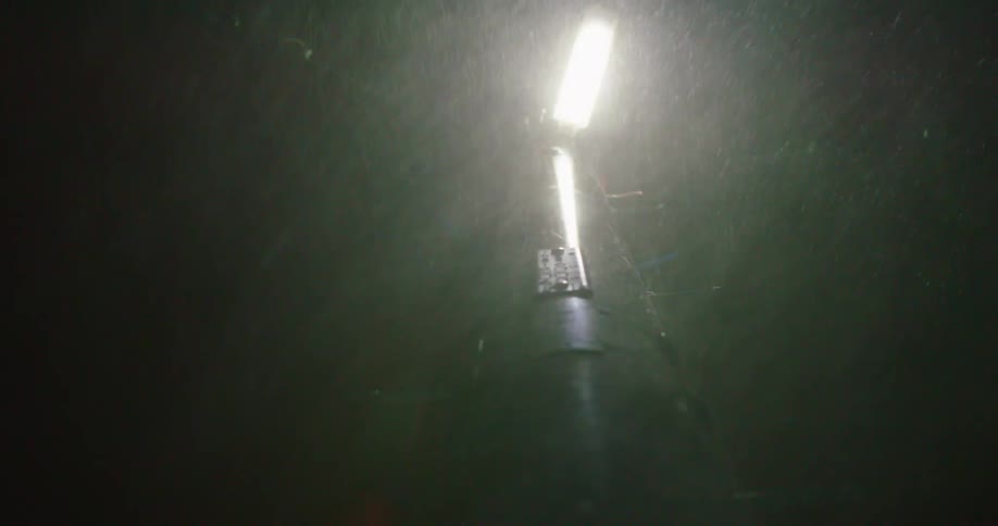 Heavy rain pours down at night