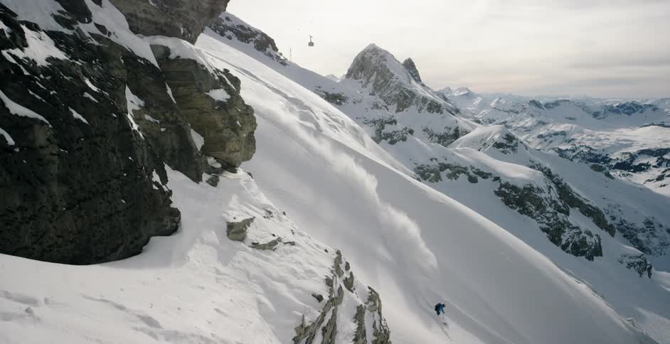 A person skiing down a mountain