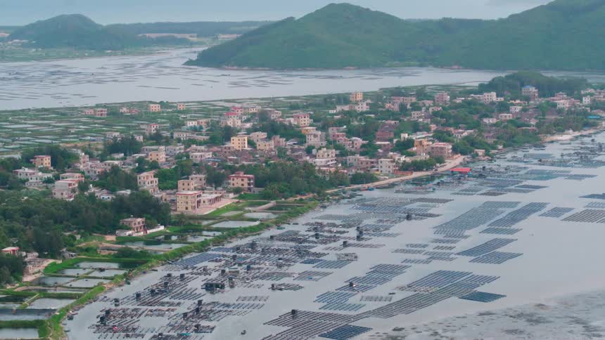 A town on a peninsula is partially flooded