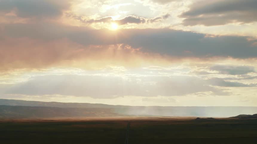 The sun is setting in the horizon
