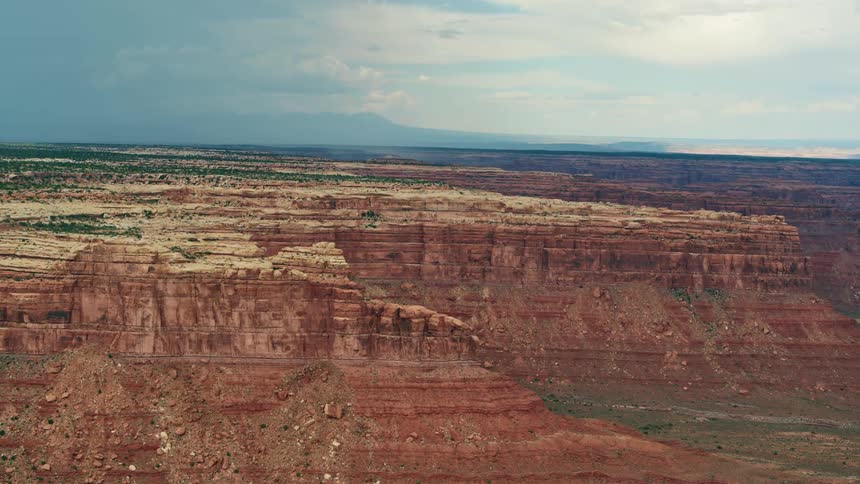 An aerial view of a rocky desert canyon in nature