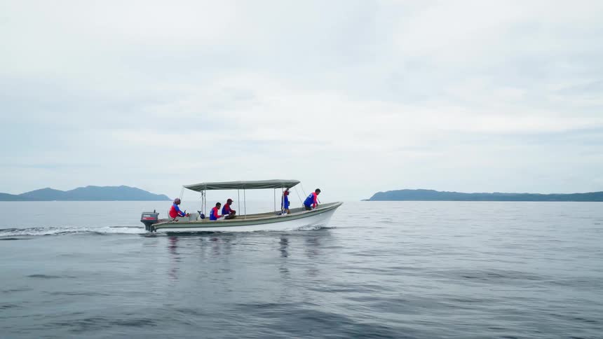 Rangers on a patrol boat