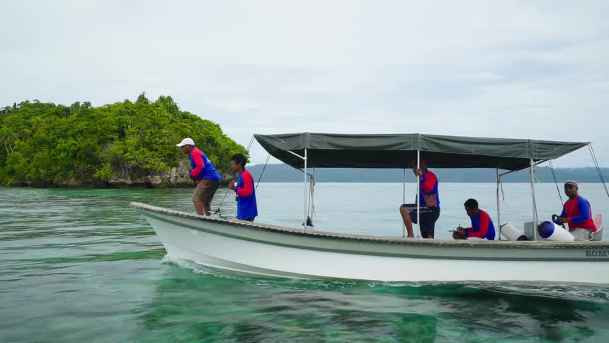 Rangers on a patrol boat