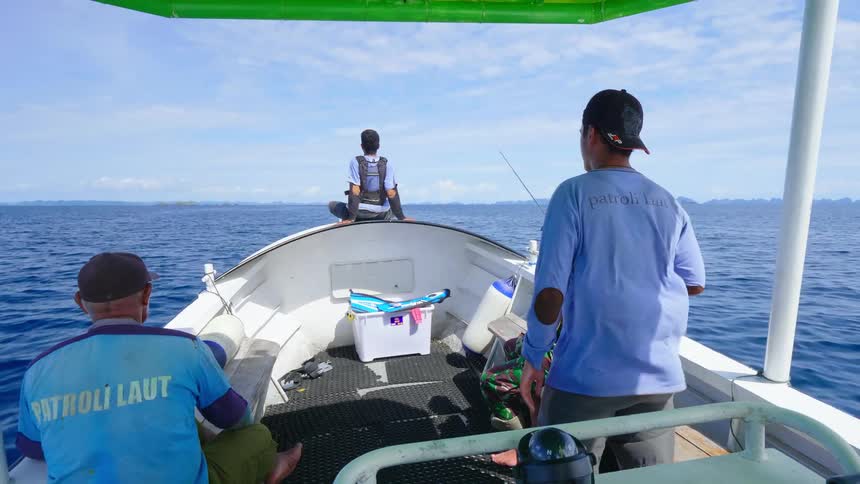 Rangers on a patrol boat