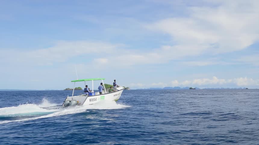 Rangers on a patrol boat