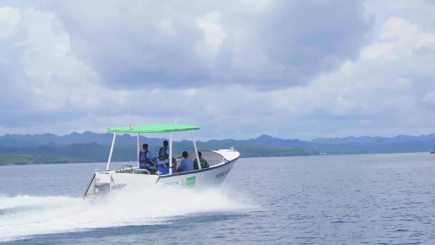 Rangers on a patrol boat