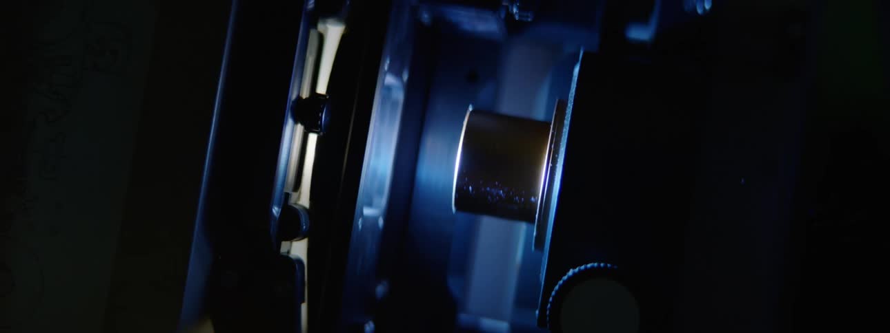 Light shining from a projector in the dark