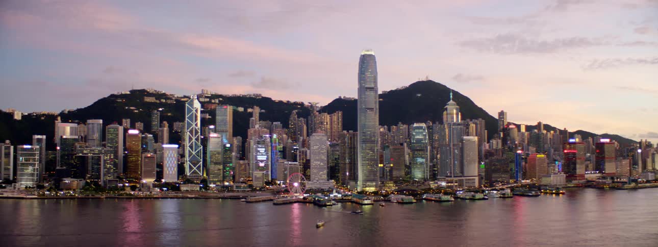 Aerial view of a downtown city is displayed at dusk