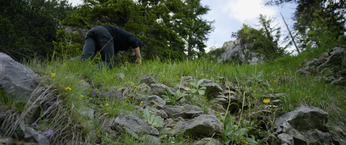 A man is climbing up the mountain