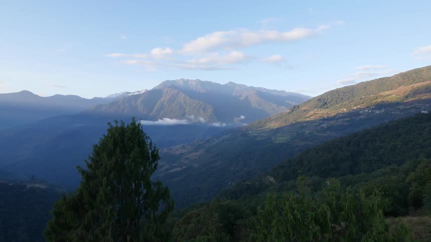 Aerial view of a mountain range on a sunny day