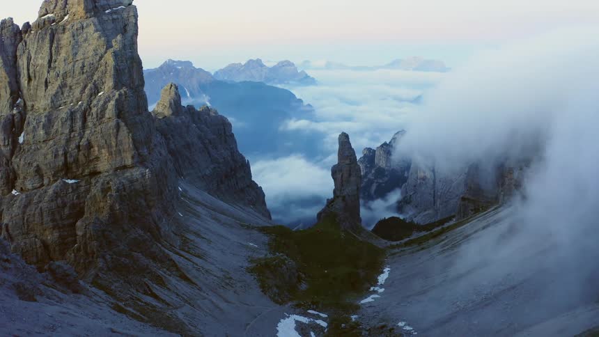 Aerial view of mountains at dusk is displayed