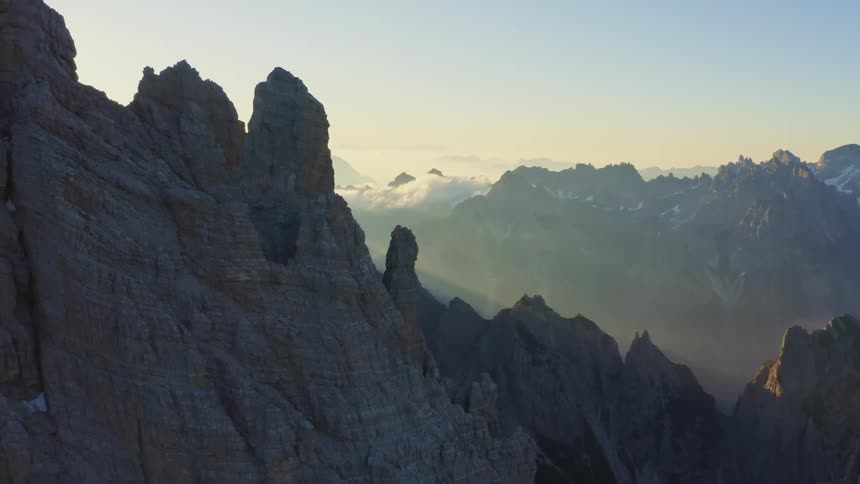 A light fog covers the mountain range