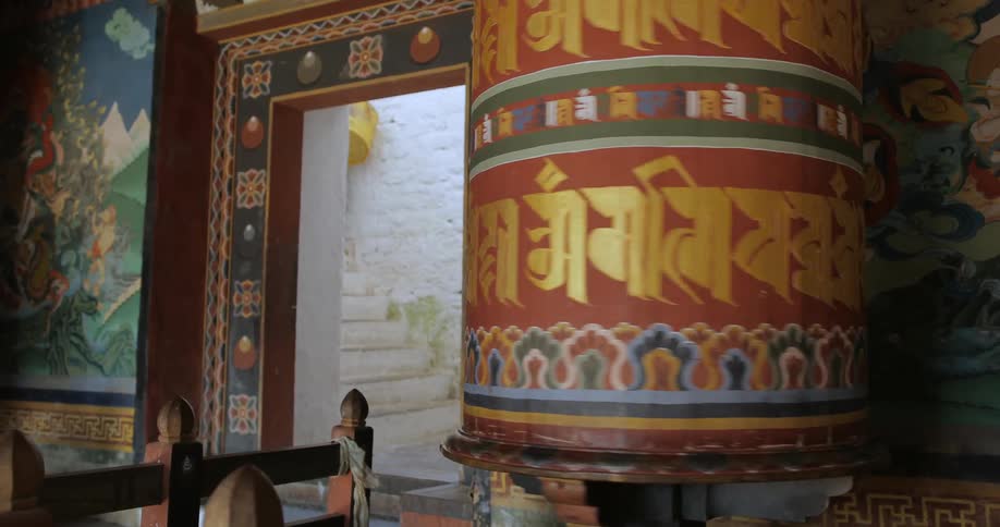 A large buddhist prayer wheel rotates