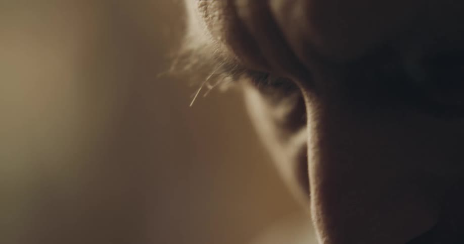 A person reaches over for something