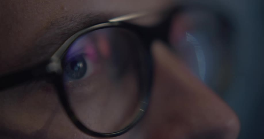 Close up of a mans eyes with glasses