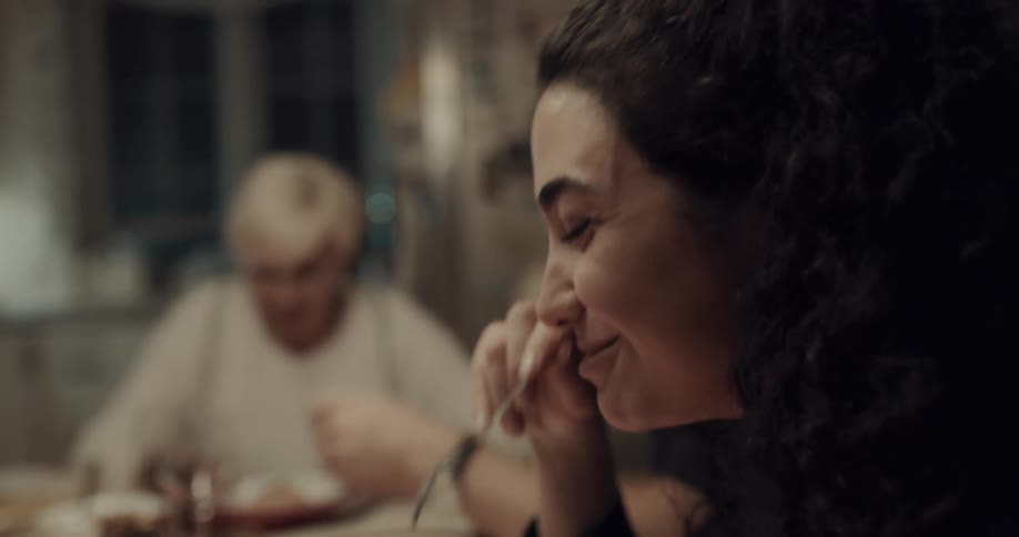People sitting at a table eating
