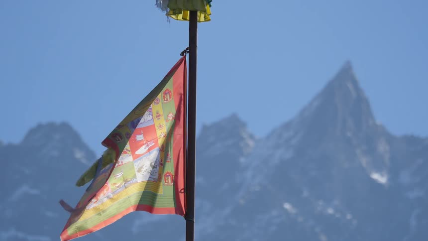 A flag flutters in the wind