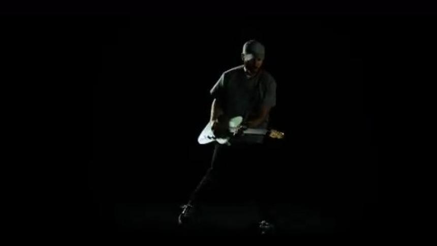A man is playing a musical instrument