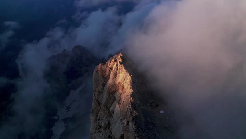 Aerial view of mountains are displayed at dusk