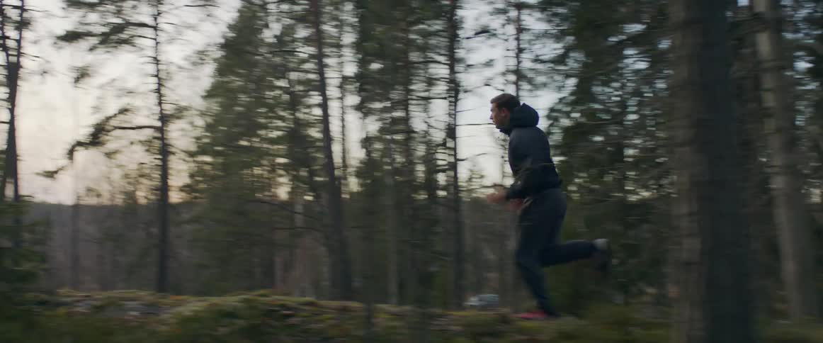 A man running through the forest