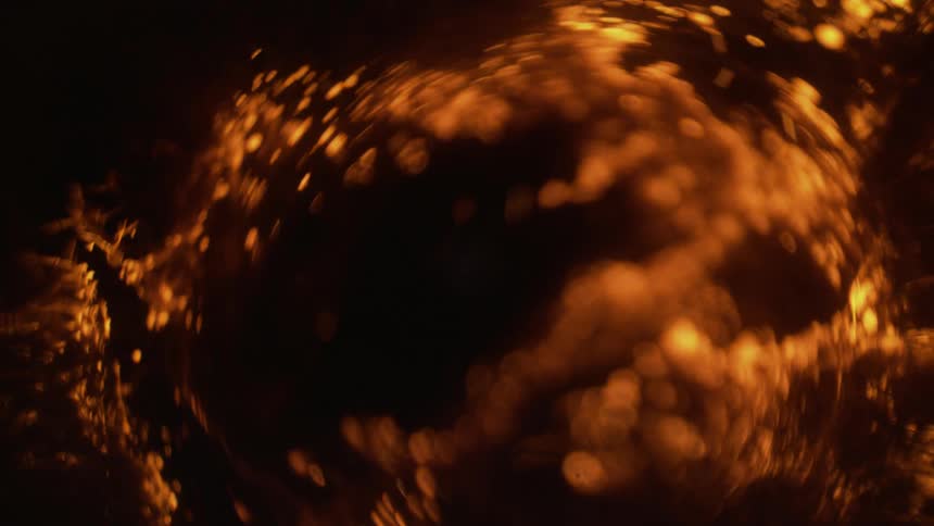 A blurry image of a fire burning