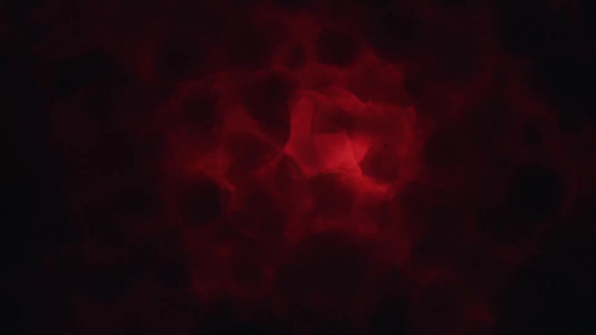 Bubbling red liquid in the dark