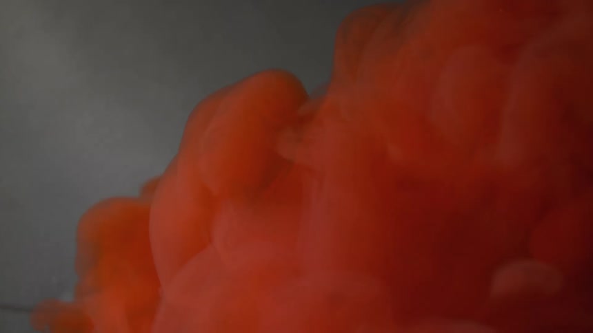 Flowing reddish orange liquid