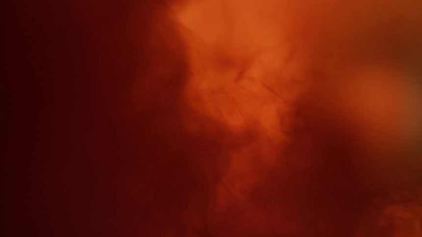 A dark red powder combines with an orange liquid