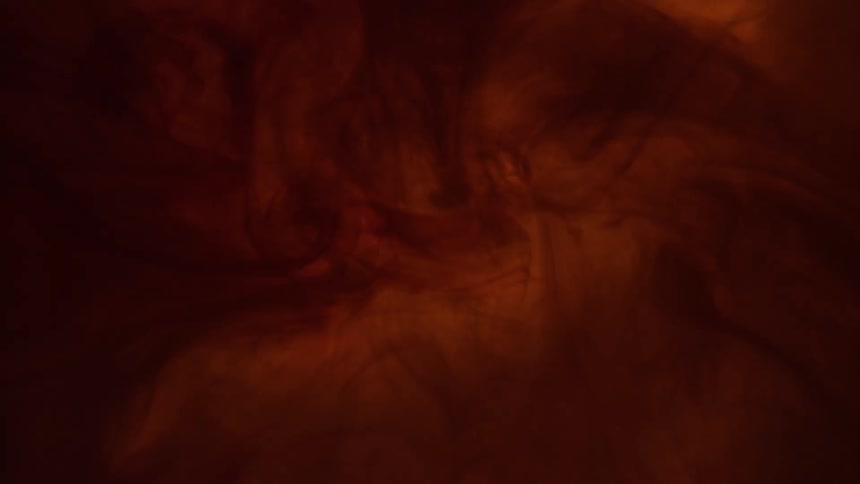 A light glows red under a thin membrane up close