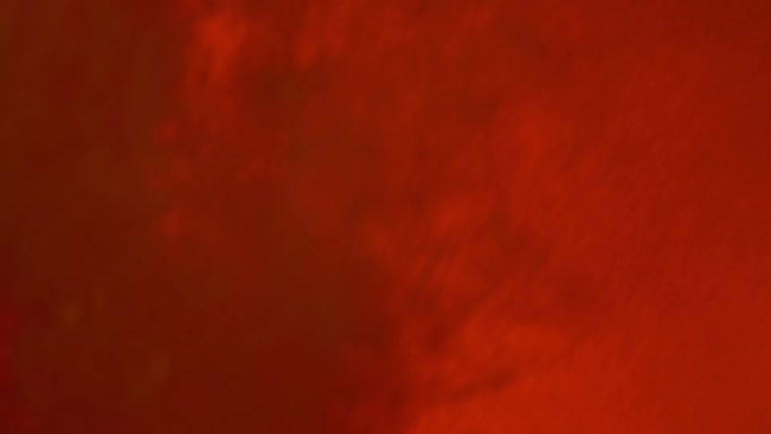 Chaotic orange smoke flashing