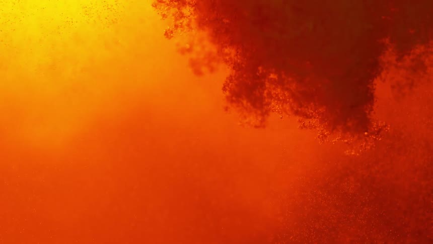 Flowing orange and yellow liquid