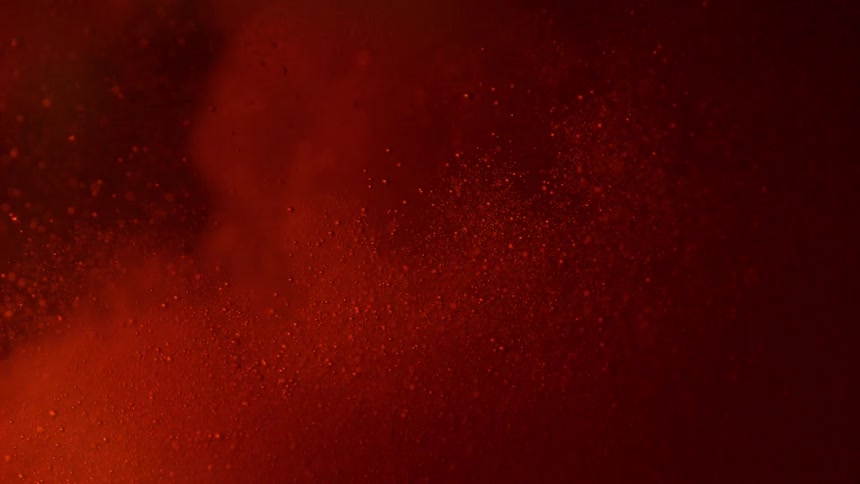 Bubbling red liquid in the dark