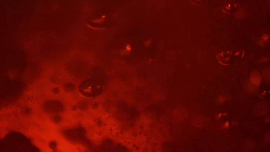 Bubbling red liquid
