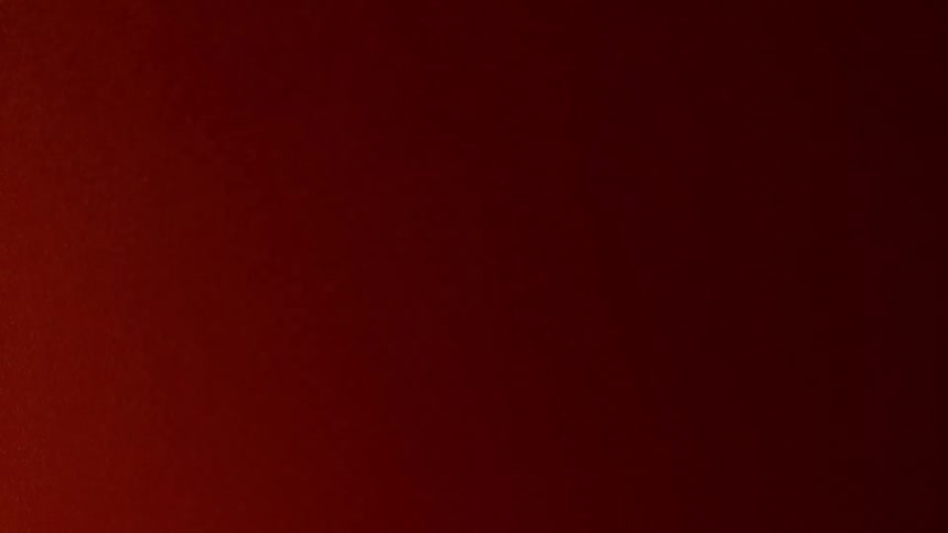 Red color fading and changing into different shades with light