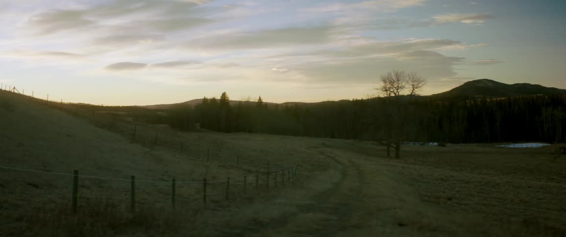 The sun is setting in the horizon