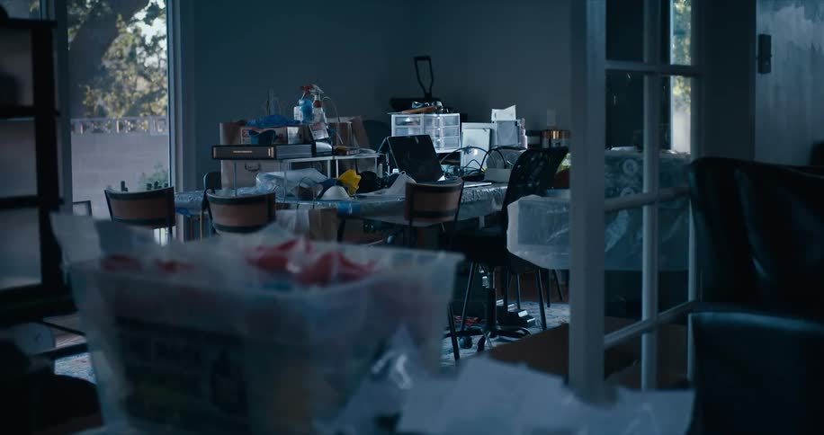 The inside of a home with a laptop on a table