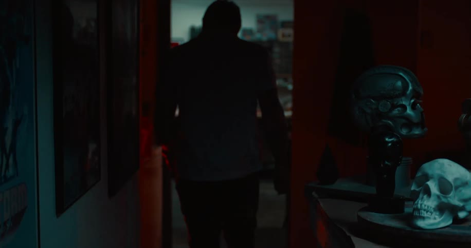 A man walks down the hall