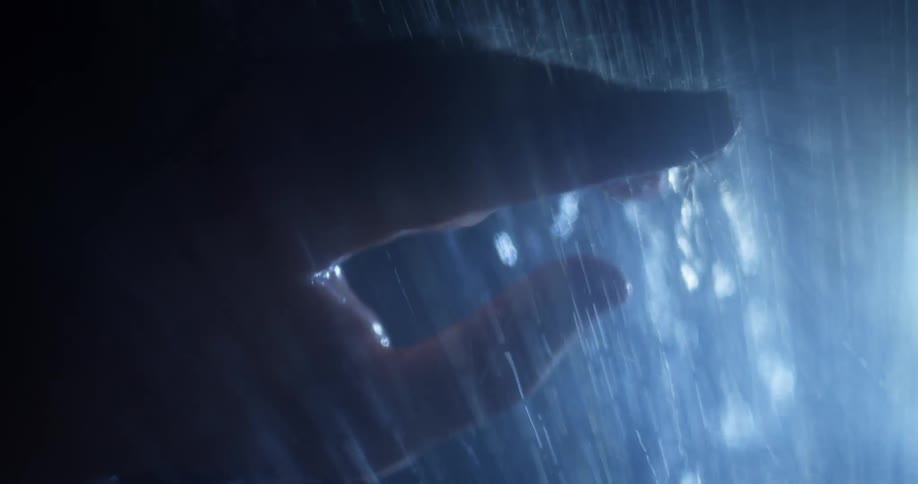 Hand moving around in rain