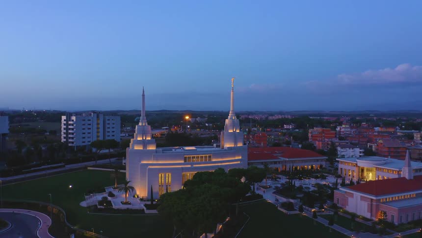 Drone flying around orbiting a architectural building