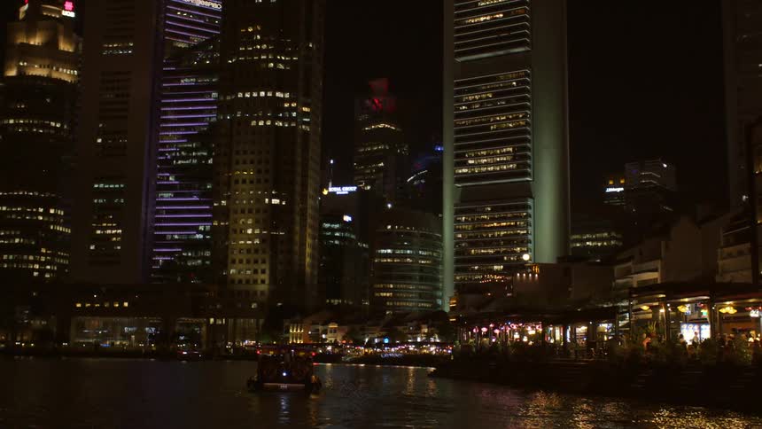 An urban city is displayed at night