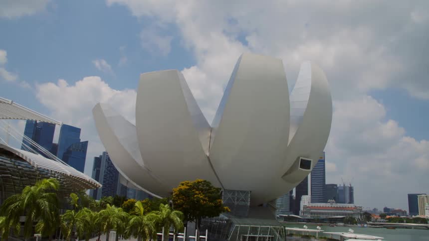 Architecture in the middle of a city besides the ocean